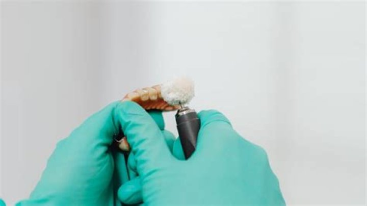 Are dentures hard to get used to?